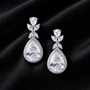 925 Silver Teardrop Halo Earrings on black background