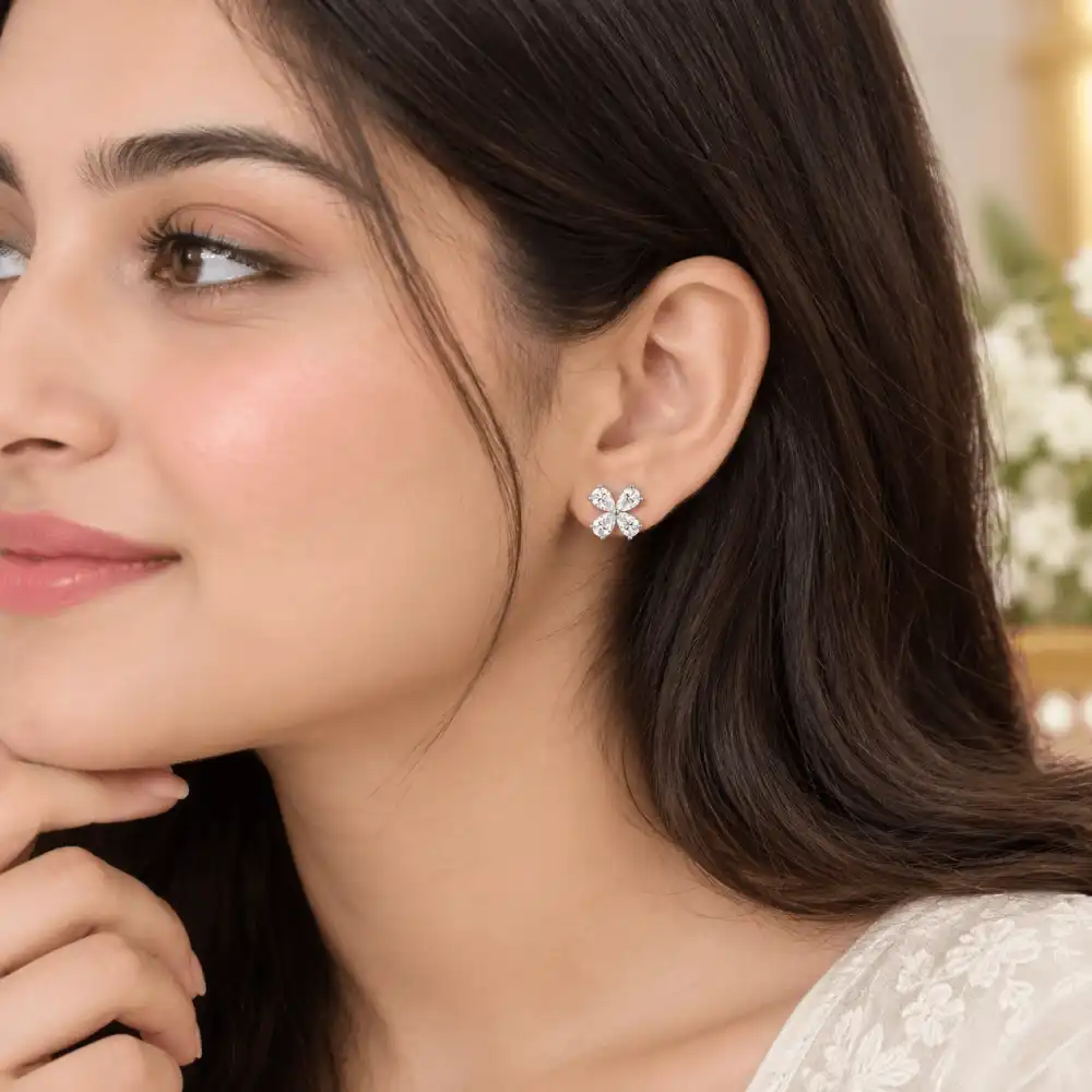 Silver Clover Earrings with Zircon 2 Woman wearing silver clover earrings in 925 sterling silver