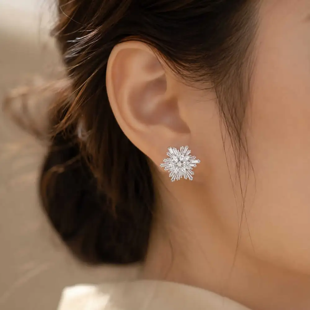 Snowflake Stud Earrings – 925 Silver 2 Woman wearing Snowflake Stud Earrings